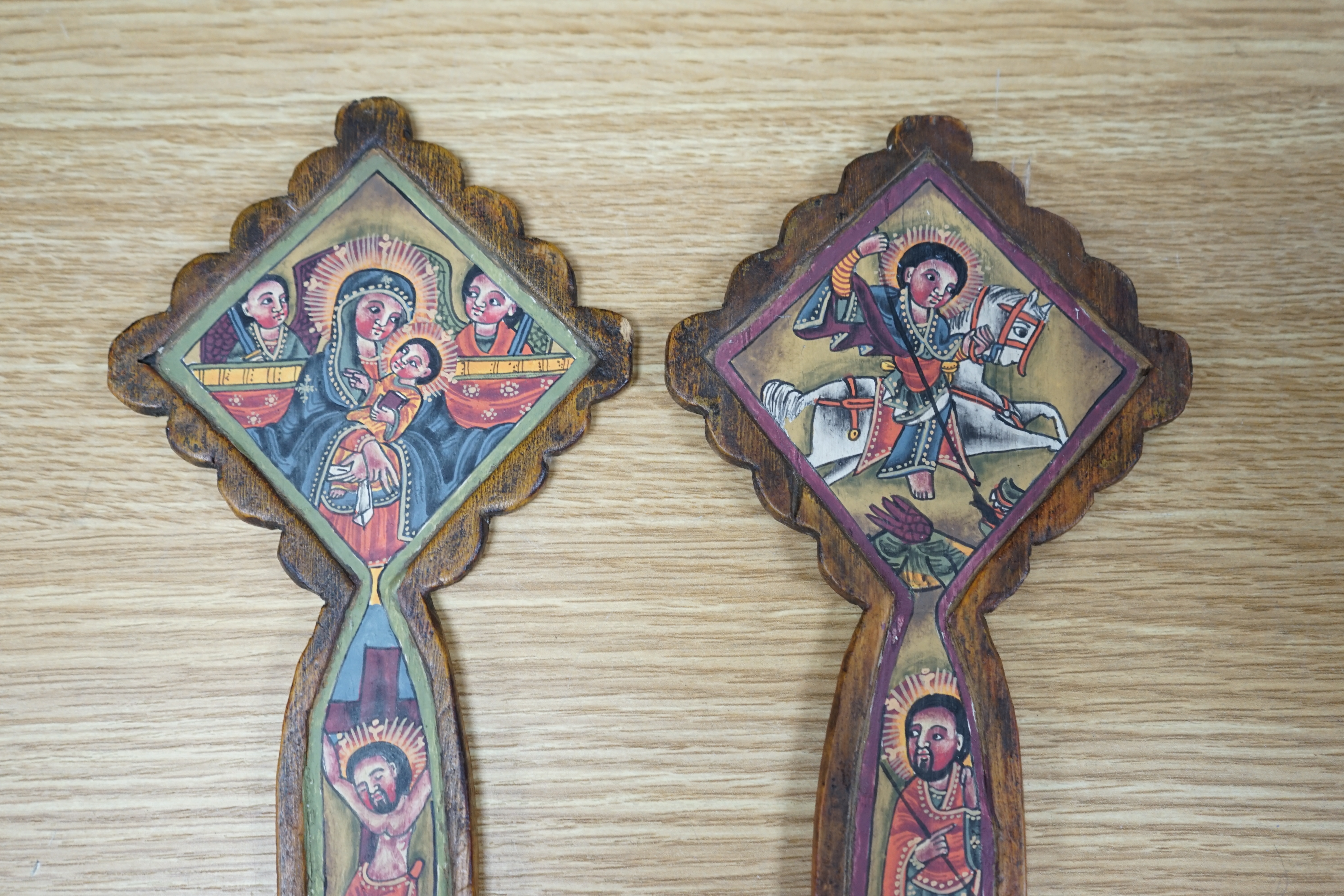 A pair of Coptic Church diptych crosses, Ethiopia, 34cm high. Condition - fair to good